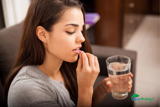 Woman taking Probiotics