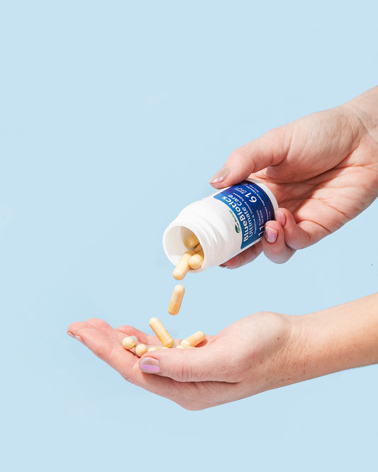 bluebiotics ultimate care probiotics with capsules in hand